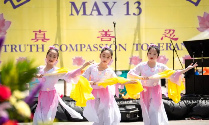 Falun Gong practitioners celebrate World Falun Dafa Day in New York City on May 7, 2023. (Samira Bouaou/The Epoch Times)