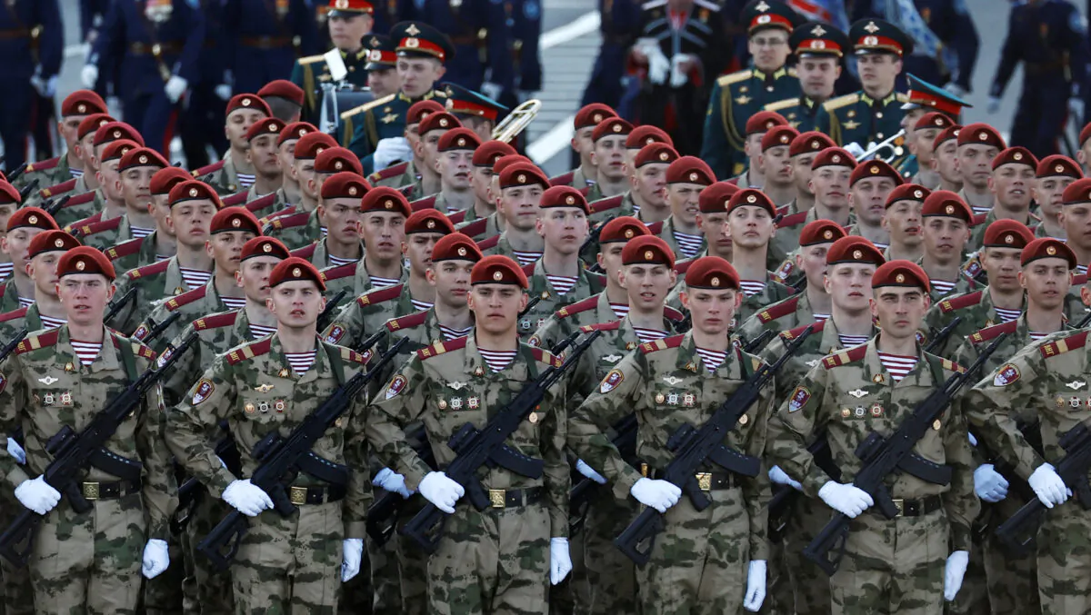 Russian service members march in columns before a rehearsal for a military parade, which marks the anniversary of the victory over Nazi Germany in World War II, in Moscow on May 7, 2023. (Maxim Shemetov/Reuters)