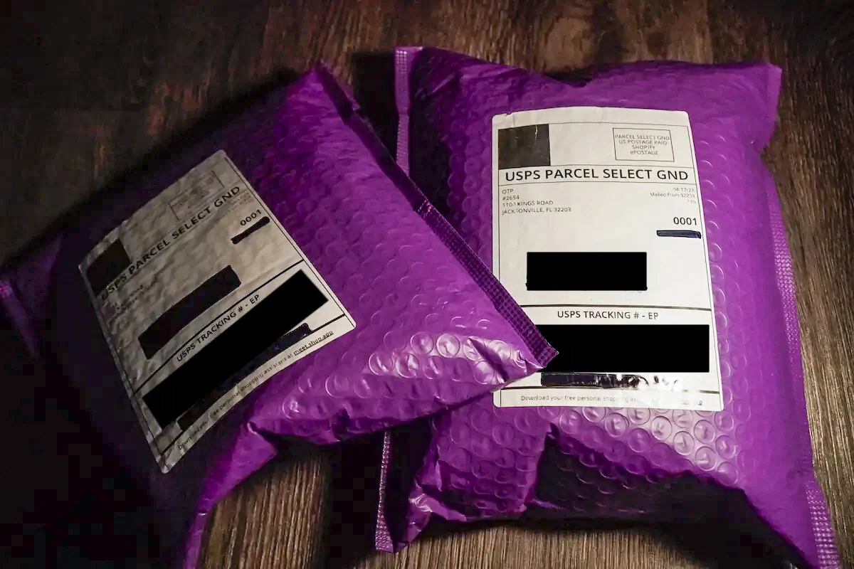 Packages containing a free breast binder and other items sent by the Queer Trans Project and obtained by The Epoch Times. (The Epoch Times)