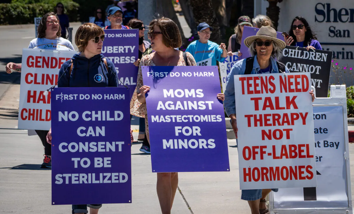 Detransitioner advocates protest outside of the annual Pediatric Endocrine Society conference held in San Diego, Calif., on May 6, 2023. (John Fredricks/The Epoch Times)