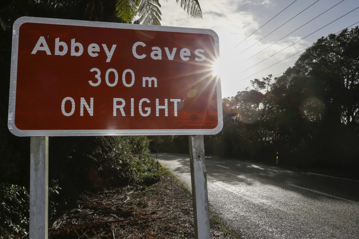 A sign is posted near where a student drowned following heavy rain near the northern New Zealand city of Whangarei, on May 10, 2023. (Michael Cunningham/Northern Advocate via AP)