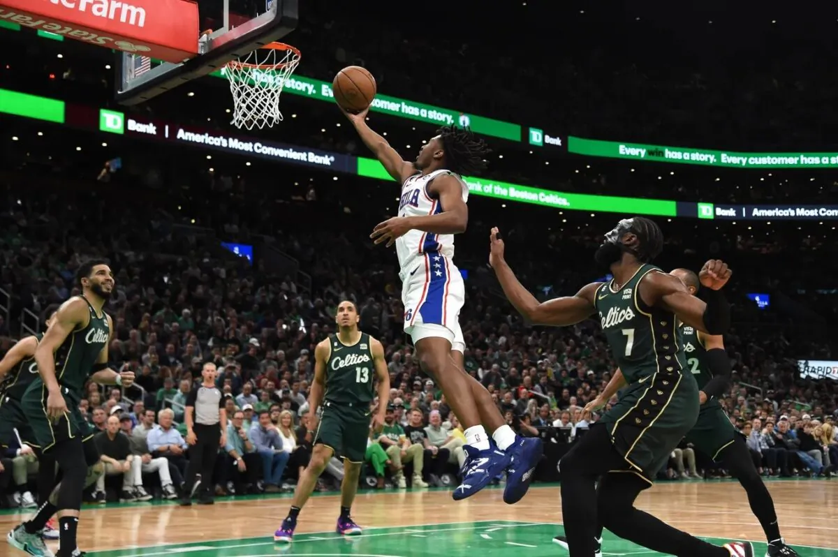 Philadelphia 76ers guard Tyrese Maxey (0) lays the ball in the basket past Boston Celtics guard Jaylen Brown (7) in the first half during game five of the 2023 NBA playoffs at TD Garden, in Boston on May 9, 2023. (Bob DeChiara/USA TODAY Sports via Field Level Media)