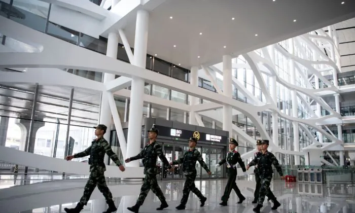 Chinese paramilitary police in the Daxing International Airport in Beijing on Sept. 28, 2019. (Noel Celis /AFP via Getty Images)