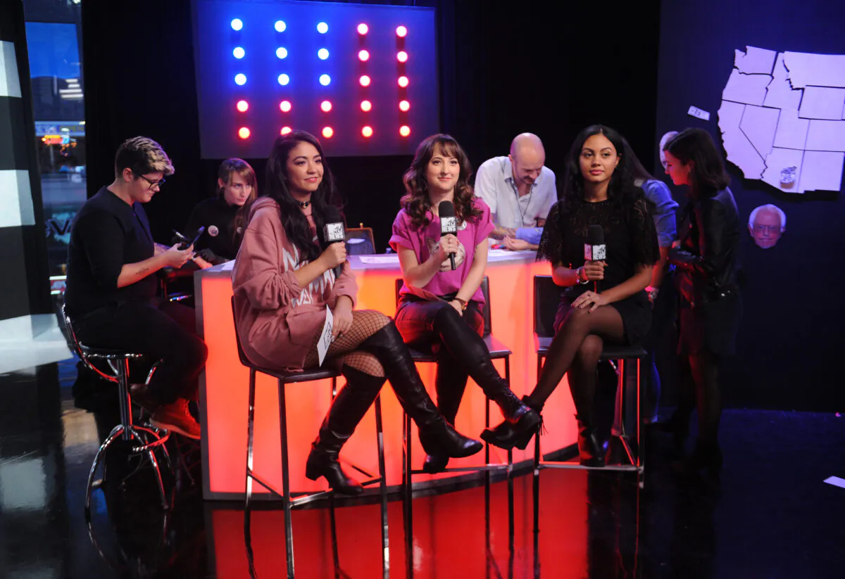 (L-R) MTV News correspondents Julianne Ross, Gaby Wilson, and Planned Parenthood representative and director of Operations at One Girl, Elaine Paredes, speak on stage during MTV News Election Night: "The People's Playhouse" at MTV Studios in New York City on Nov. 8, 2016. (Brad Barket/Getty Images for MTV News)