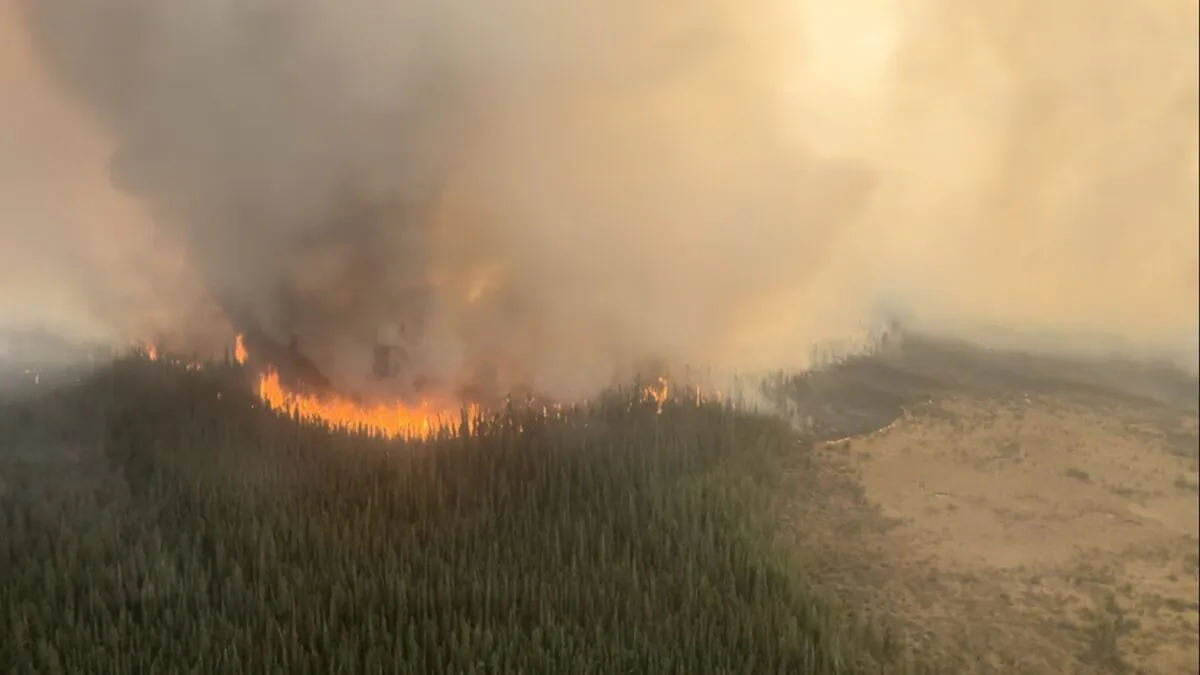The East side of the Paskwa fire (HWF030) burns in the High Level Forest Area district of Alberta in a May 9, 2023, handout photo. (The Canadian Press/HO-Government of Alberta Fire Service)
