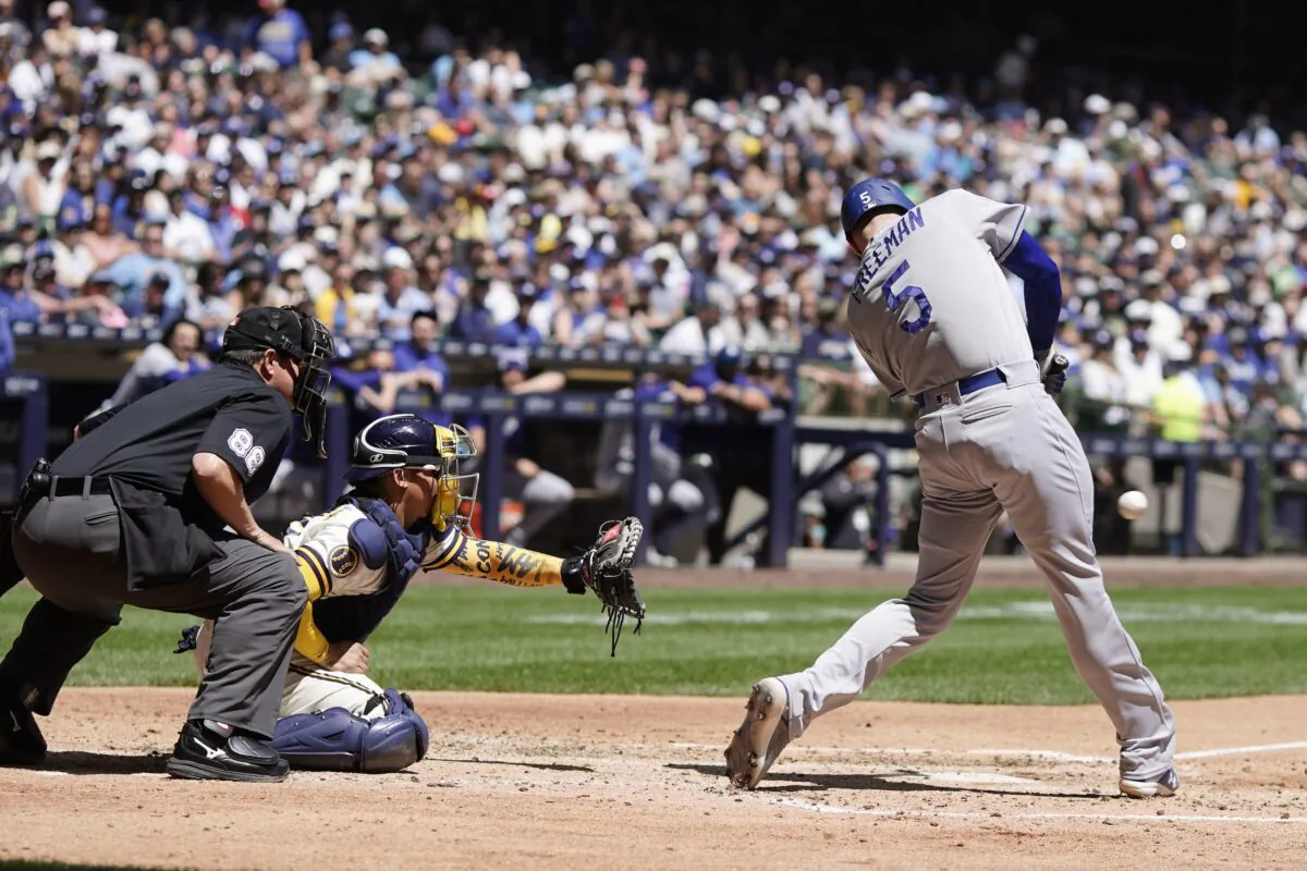Los Angeles Dodgers' Freddie Freeman hits a two-run scoring single during the fifth inning of a baseball game against the Milwaukee Brewers in Milwaukee on May 10, 2023. (Morry Gash/AP Photo)
