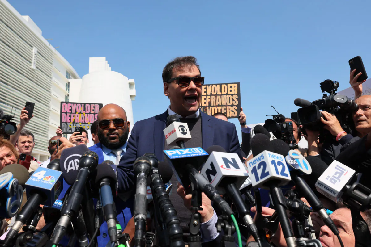 Rep. George Santos (R-N.Y.) speaks with members of the press as he leaves Federal Court in Central Islip, New York, on May 10, 2023. (Michael M. Santiago/Getty Images)