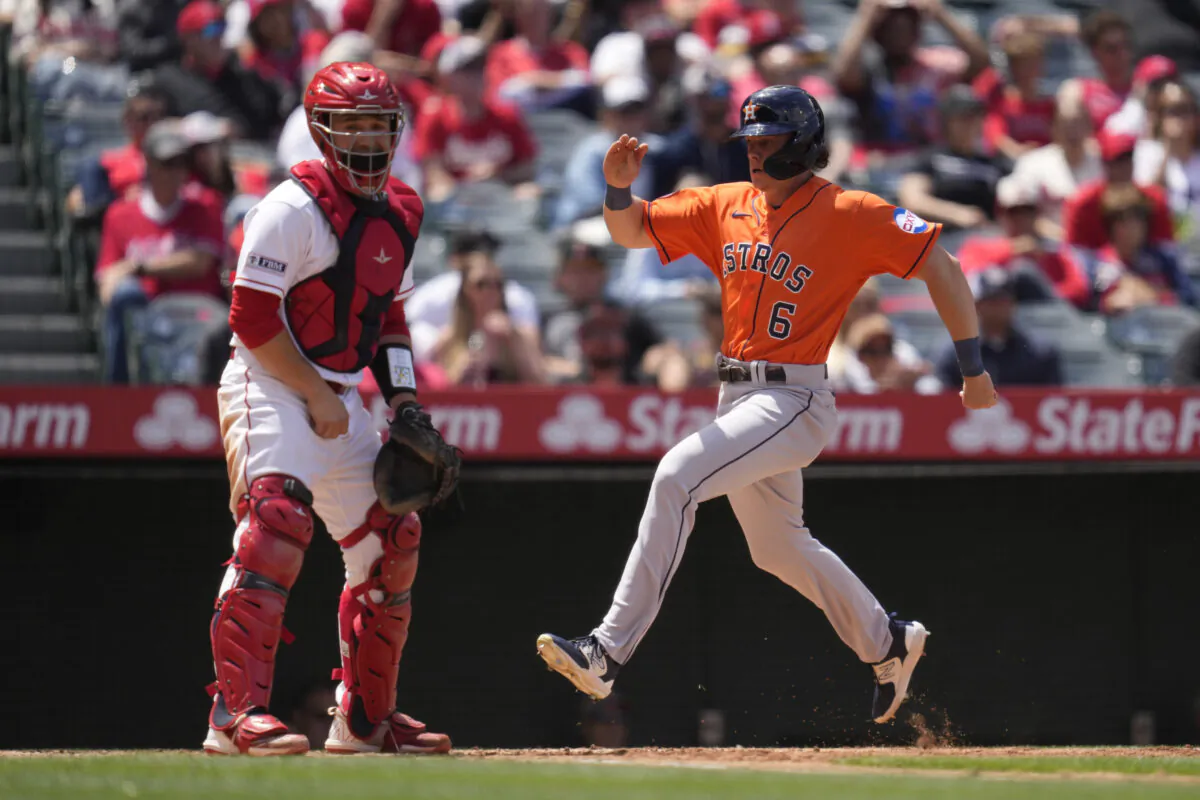 Houston Astros' Jake Meyers (6) scores off of a single by Jeremy Pena during the fourth inning of a baseball game in Anaheim, Calif.,  on May 10, 2023. (Ashley Landis/AP Photo)