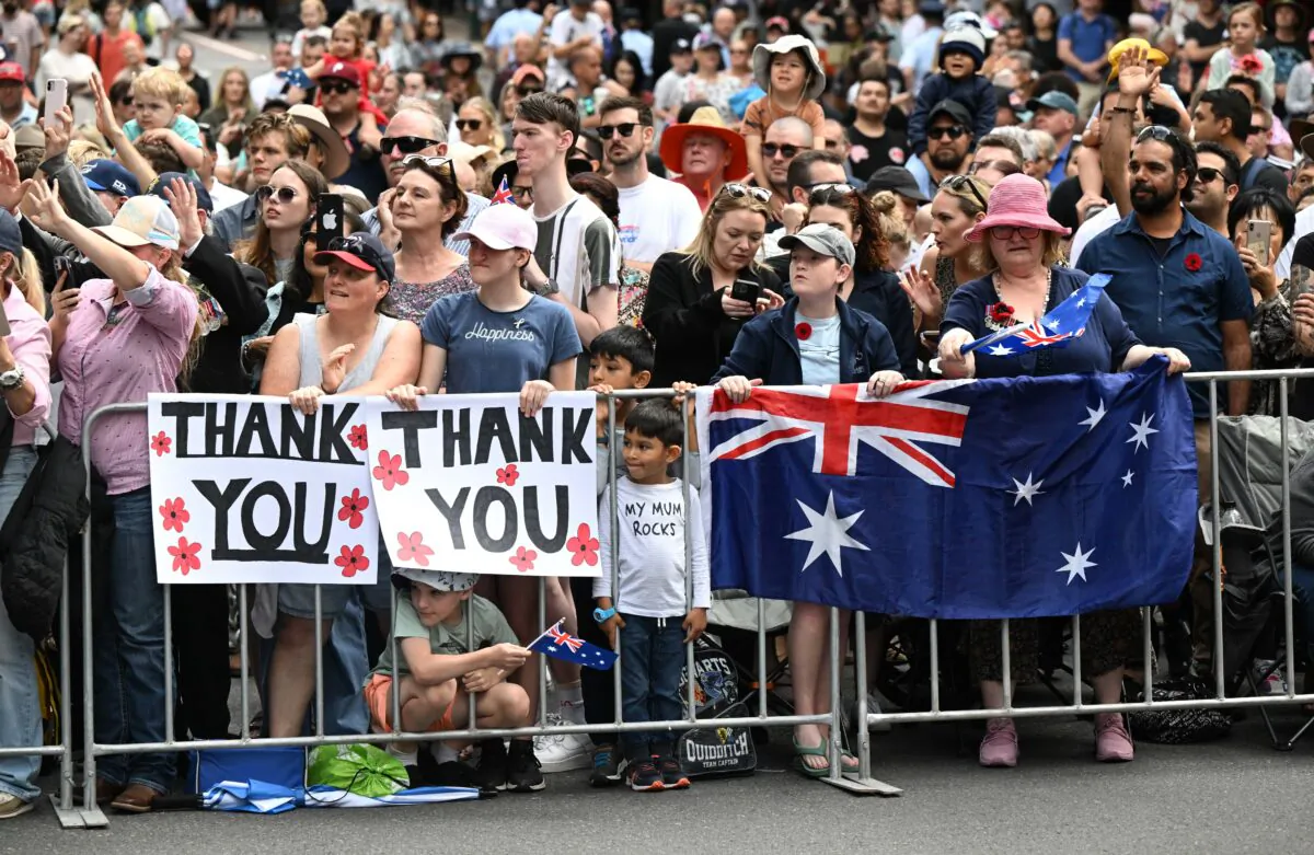 Crowds are seen as War veterans march by during the ANZAC Day March in Brisbane, Australia, on April 25, 2023. (AAP Image/Darren England) 