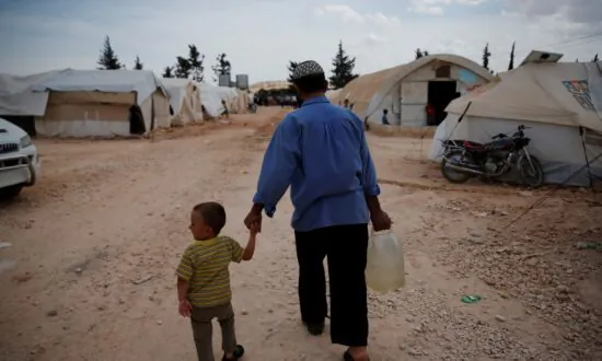 War, Natural Disasters Left Record 71 Million People Internally Displaced in 2022, Report Says