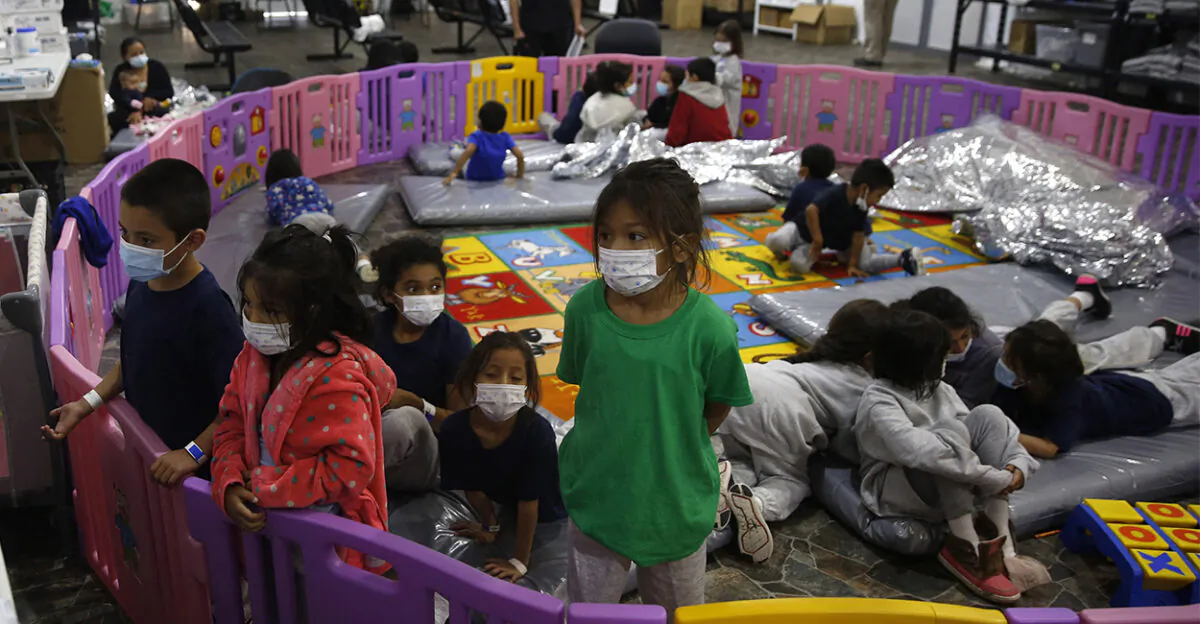 Unaccompanied children, ages 3-9, inside a playpen at the Donna Department of Homeland Security holding facility, the main detention center for unaccompanied children in the Rio Grande Valley in Donna, Texas, on March 30, 2021. (Dario Lopez-Mills/Pool/AFP/Getty Images)