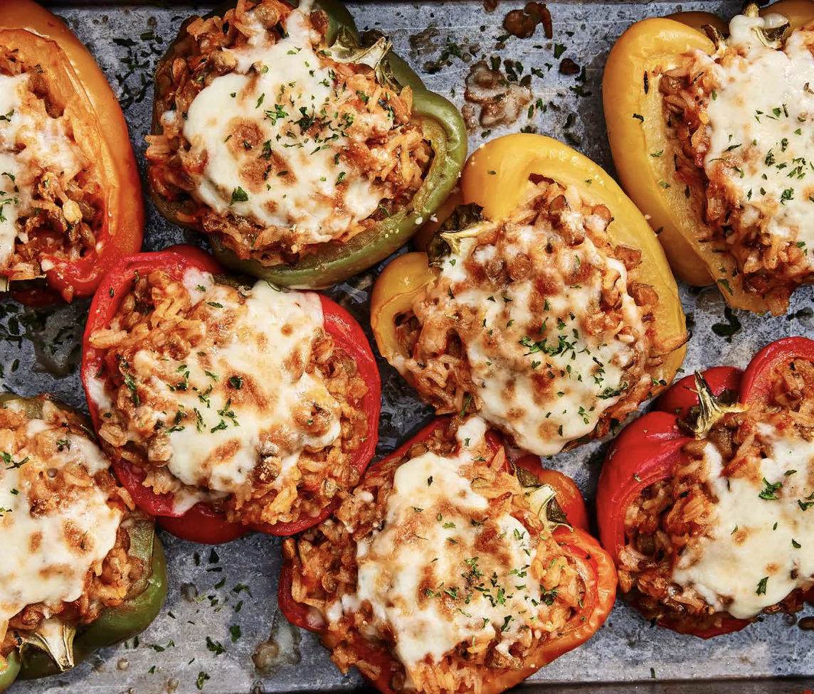 Lentils add a meaty texture and boost of protein to these stuffed peppers, topped with gooey mozzarella and Parmesan cheese. (Colin Price)
