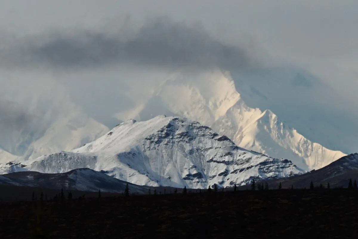 Clouds partially obscure Denali, the highest mountain peak in North America, as seen from inside Denali National Park, Alaska, on Sept. 22, 2022. (Patrick T. Fallon/AFP via Getty Images)