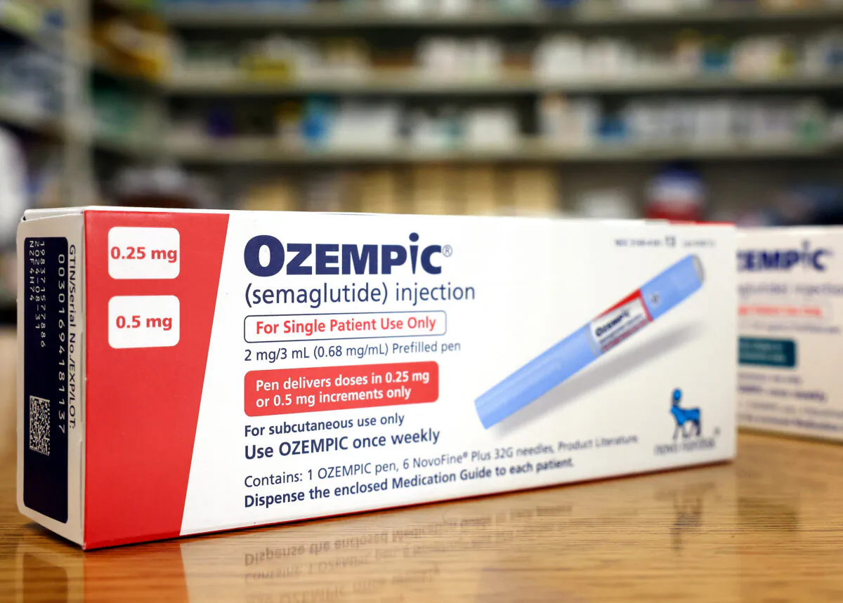 In this photo illustration, boxes of the diabetes drug Ozempic rest on a pharmacy counter in Los Angeles, California, on April 17, 2023. (Mario Tama/Getty Images)
