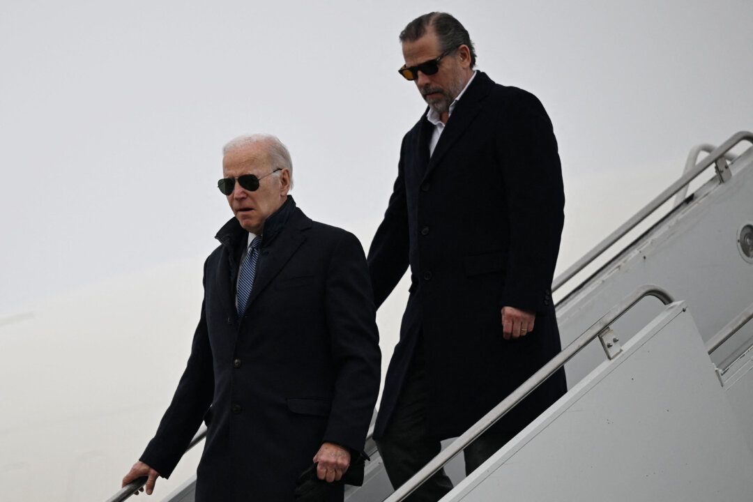 President Joe Biden, with son Hunter Biden, arrives at Hancock Field Air National Guard Base in Syracuse, New York, on Feb. 4, 2023. (Andrew Caballero-Reynolds/AFP via Getty Images)