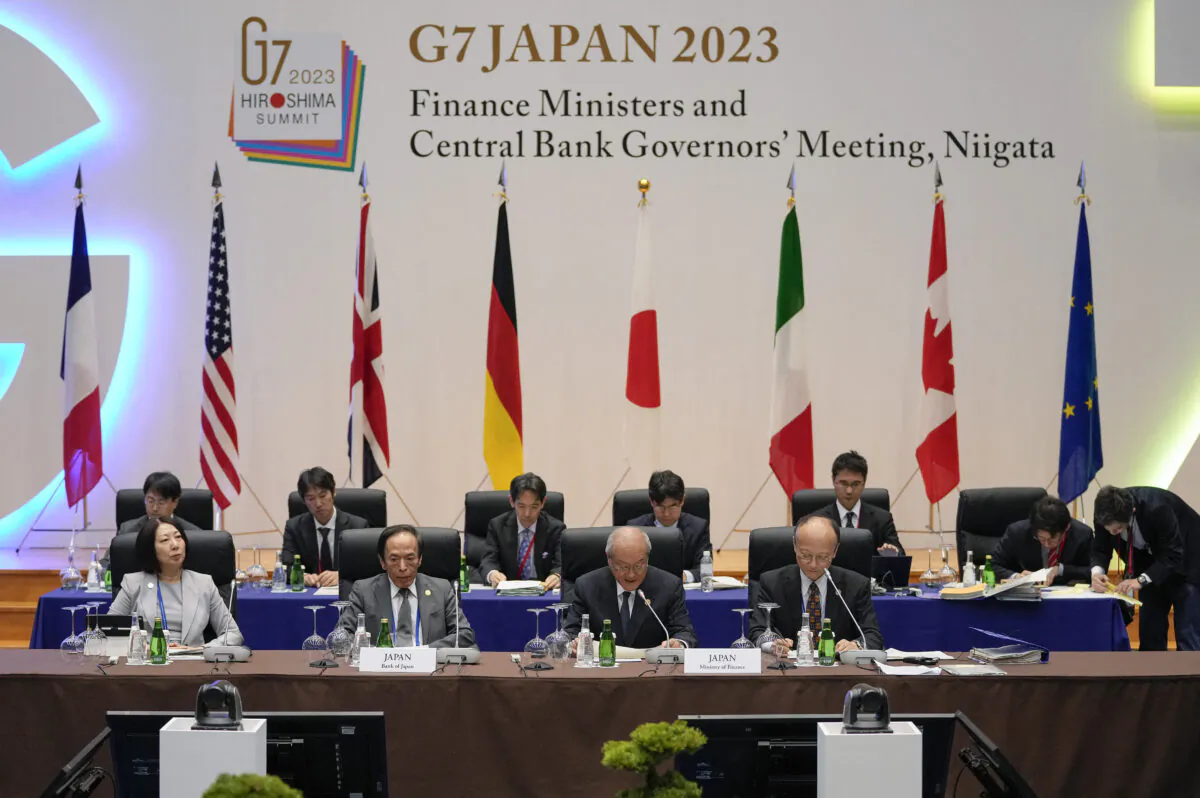 Japanese Finance Minister Shunichi Suzuki (2nd R) delivers an opening speech at the start of the G-7 Finance Ministers and Central Bank Governors Meeting at the International Conference Room of Toki Messe in Niigata, Japan, on May 11, 2023. (Kimimasa Mayama/Pool/AFP via Getty Images)