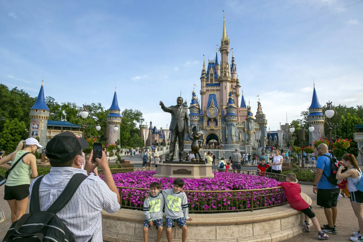 People visit the Magic Kingdom Park at Walt Disney World Resort in Lake Buena Vista, Fla., on April 18, 2022. (Ted Shaffrey/AP Photo)