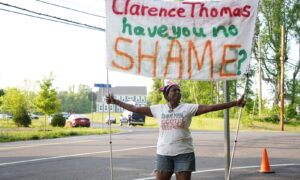 Protesters demonstrate near home of SCOTUS Justice Clarence Thomas during Democrat ethics investigation.