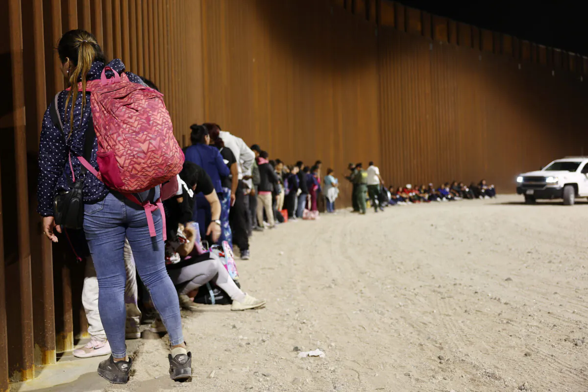 Illegal immigrants are processed by U.S. agents after crossing into Arizona from Mexico on May 11, 2023. (Mario Tama/Getty Images)
