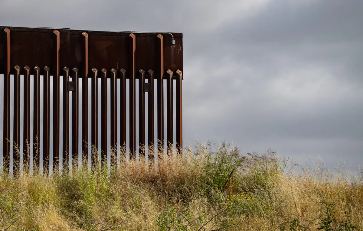 A section of the United States border wall sits open in San Diego, Calif., on May 11, 2023. (John Fredricks/The Epoch Times)