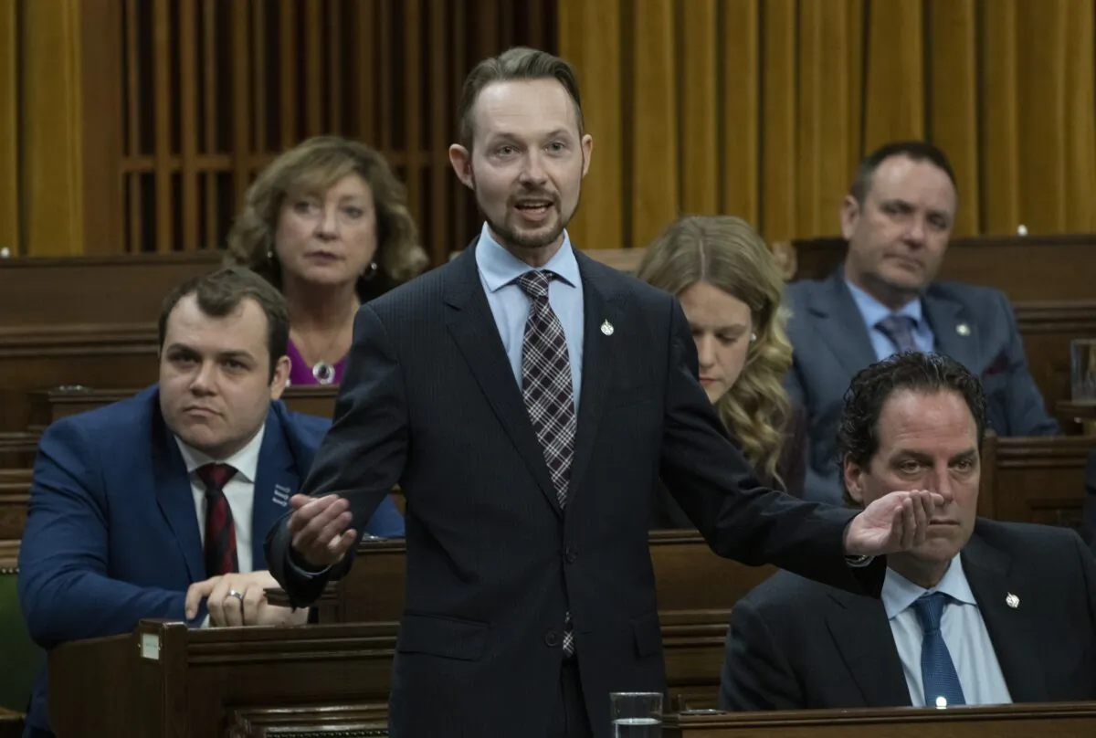 Conservative MP Michael Cooper rises during question period on Parliament Hill in Ottawa on April 28, 2023. (Adrian Wyld/The Canadian Press)