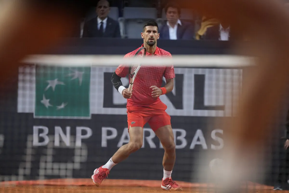 Serbia's Novak Djokovic returns the ball to Argentina's Tomas Etcheverry during their match at the Italian Open tennis tournament in Rome on May 12, 2023. (Andrew Medichini/AP Photo)