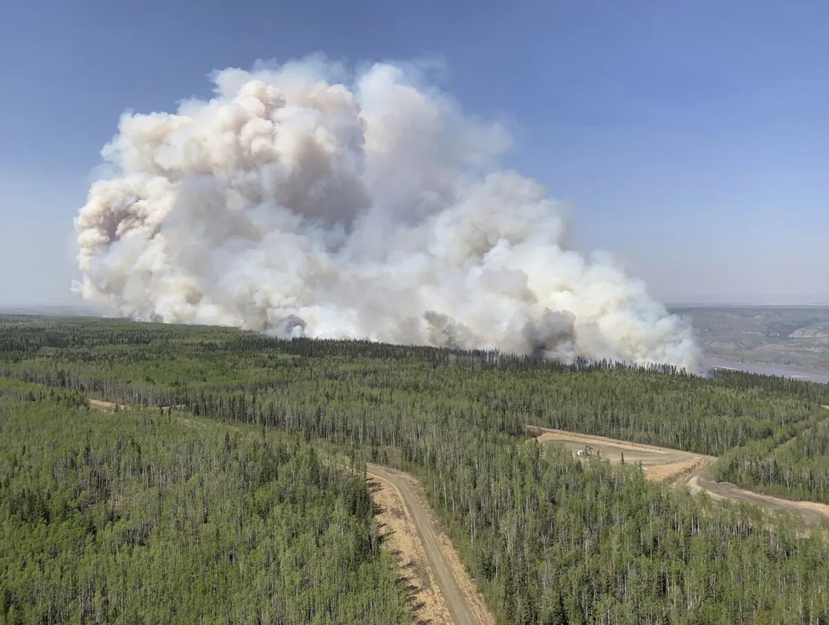 A wildfire burns a section of forest in the Grande Prairie district of Alberta, Canada, on May 6, 2023. (Government of Alberta Fire Service/The Canadian Press via AP)