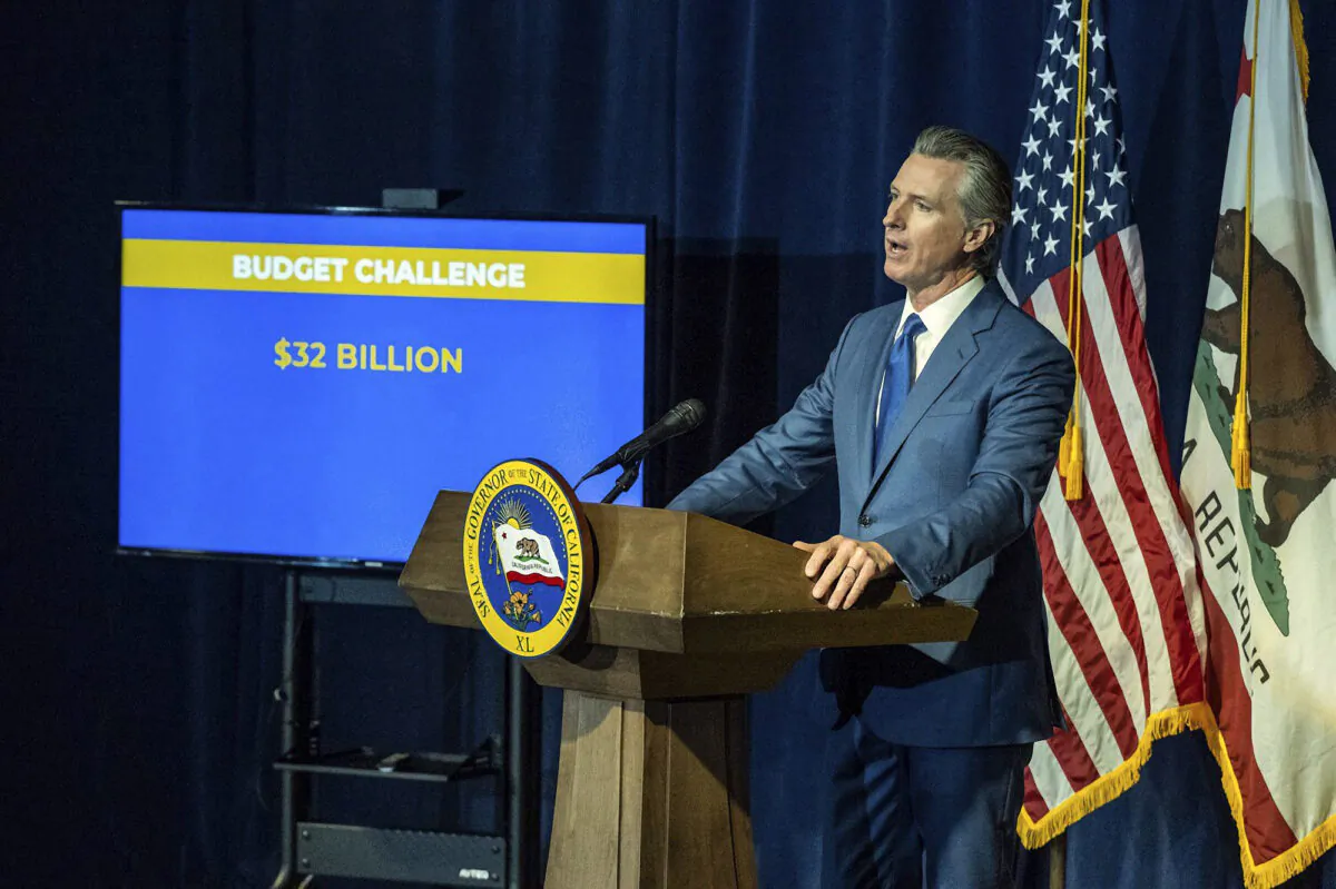California Gov. Gavin Newsom announces the May budget revision in Sacramento on May 12, 2023. Newsom said the state's budget deficit has grown to nearly $32 billion, about $10 billion more than predicted in January when the governor offered his first budget proposal. (Hector Amezcua/The Sacramento Bee via AP)