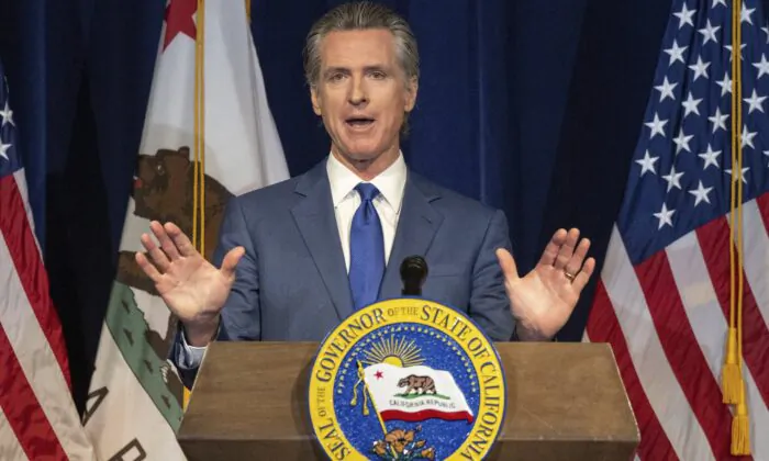 California Gov. Gavin Newsom announces the May budget revision in Sacramento on May 12, 2023. Newsom said the state's budget deficit has grown to nearly $32 billion, about $10 billion more than predicted in January when the governor offered his first budget proposal. (Hector Amezcua/The Sacramento Bee via AP)