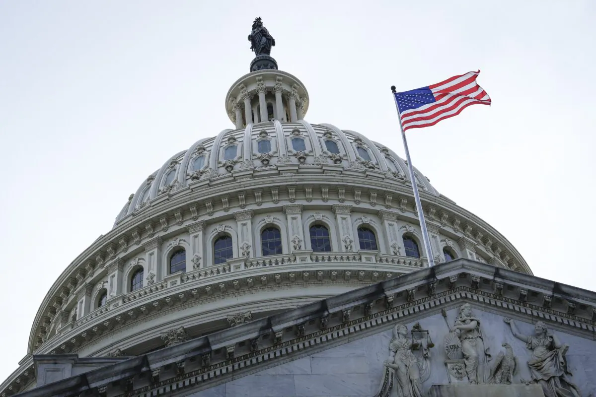 The United States flag at the dome of the U.S. Capitol building in Washington on May 12, 2023. (Madalina Vasiliu/The Epoch Times) 