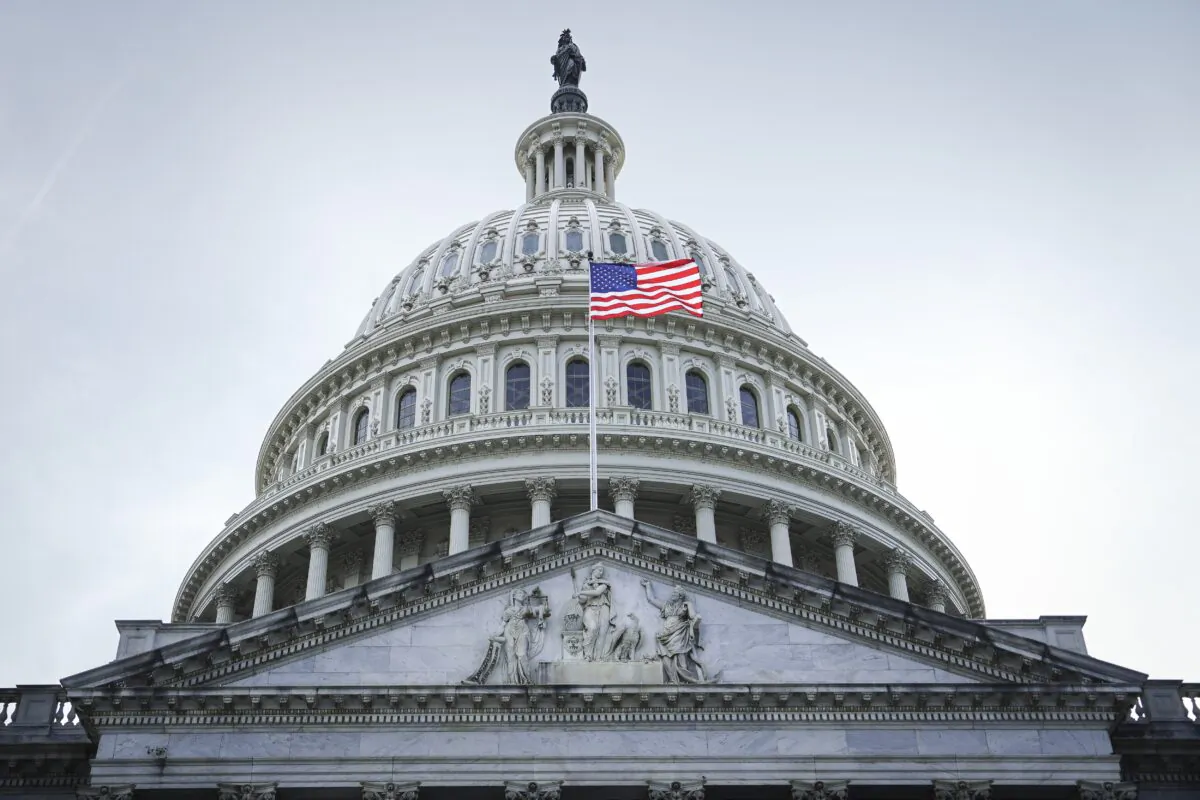 The United States flag at the dome of the U.S. Capitol building in Washington on May 12, 2023. (Madalina Vasiliu/The Epoch Times)