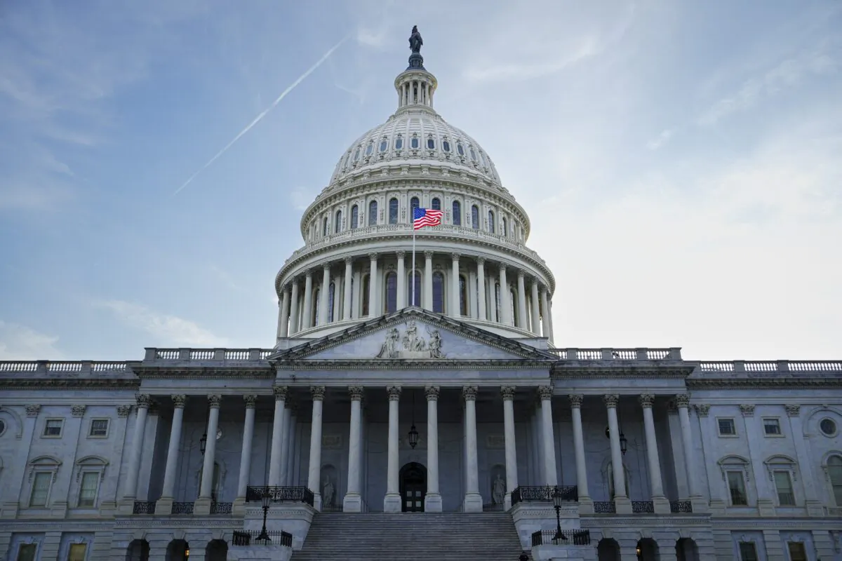 The U.S. flag at the dome of the U.S. Capitol building in Washington on May 12, 2023. (Madalina Vasiliu/The Epoch Times)