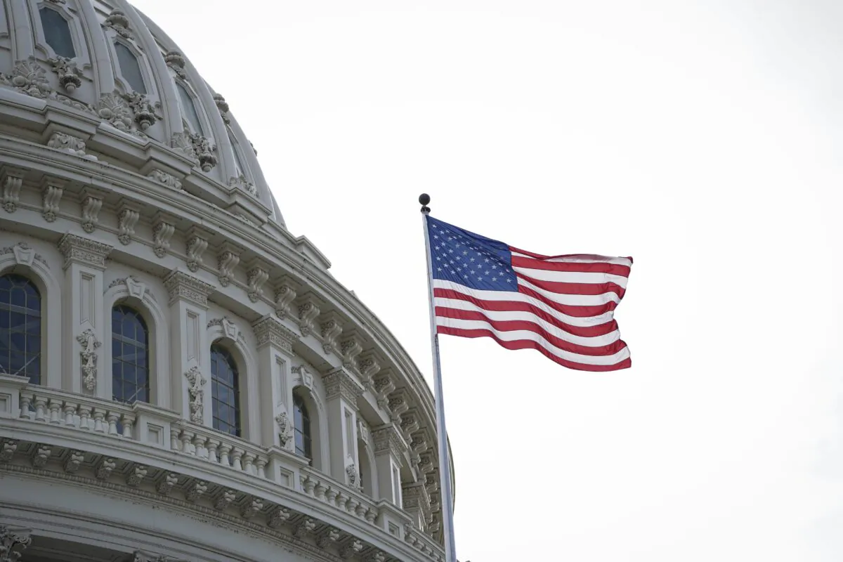 The U.S. flag at the dome of the U.S. Capitol building in Washington on May 12, 2023. (Madalina Vasiliu/The Epoch Times)