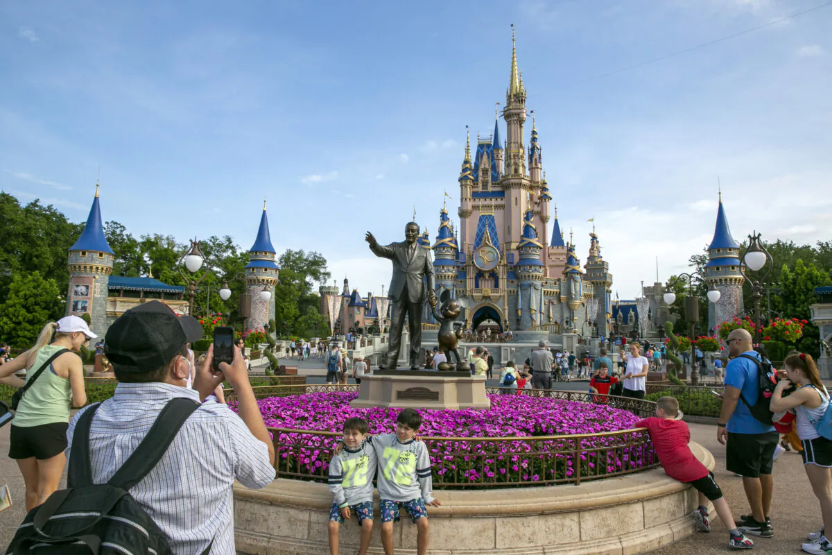 People visit the Magic Kingdom Park at Walt Disney World Resort in Lake Buena Vista, Fla., on April 18, 2022. (Ted Shaffrey/AP Photo)
