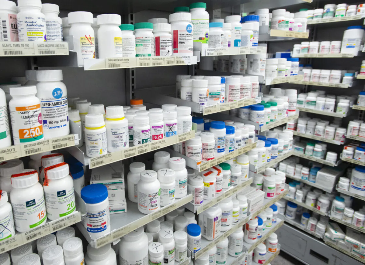 Prescription drugs sit on shelves at a pharmacy in Montreal on March 11, 2021. (Ryan Remiorz/The Canadian Press)