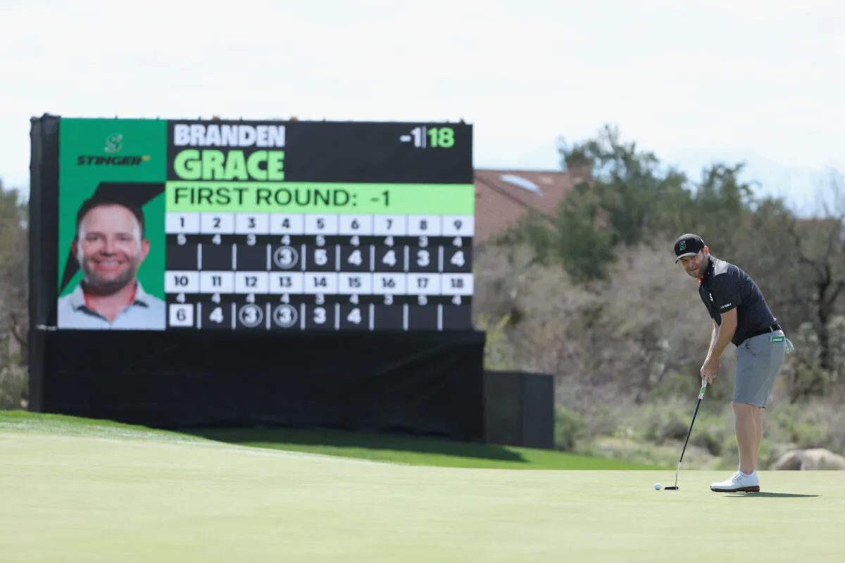 Branden Grace of Stinger GC putts on the 16th green during Day One of the LIV Golf Invitational - Tucson at in Tucson, Ariz., on March 17, 2023. (Christian Petersen/Getty Images)