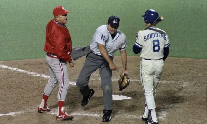 St. Louis Cardinals manager Whitey Herzog (L) is ejected by home plate umpire Don Denkinger (C) during Game 7 of the baseball team's World Series against the Kansas City Royals in Kansas City, Mo., on Oct. 27, 1985. (Joe Ledford/AP Photo)