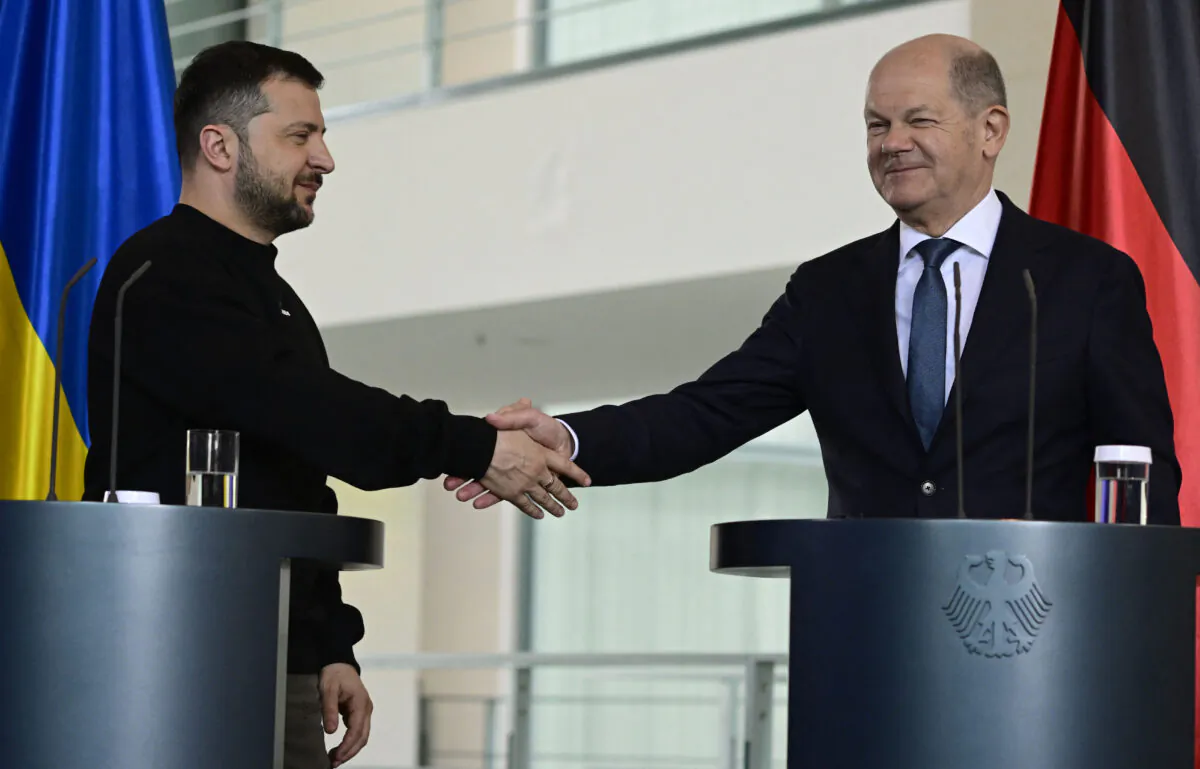 German Chancellor Olaf Scholz (R) and Ukraine's President Volodymyr Zelensky shake hands at the end of a joint press conference following their meeting at the Chancellery in Berlin on May 14, 2023 . (John MacDougall/AFP via Getty Images)