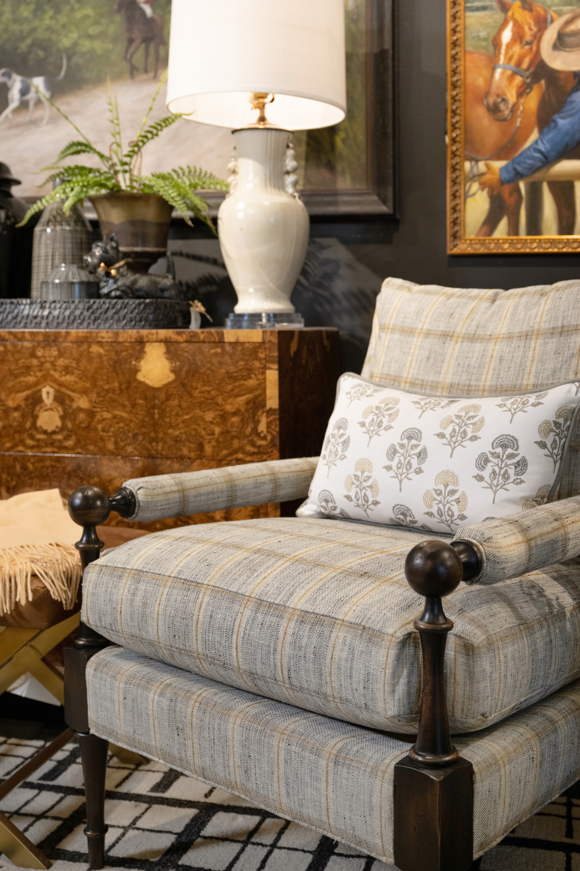 A living room setup with an armchair and pillow
