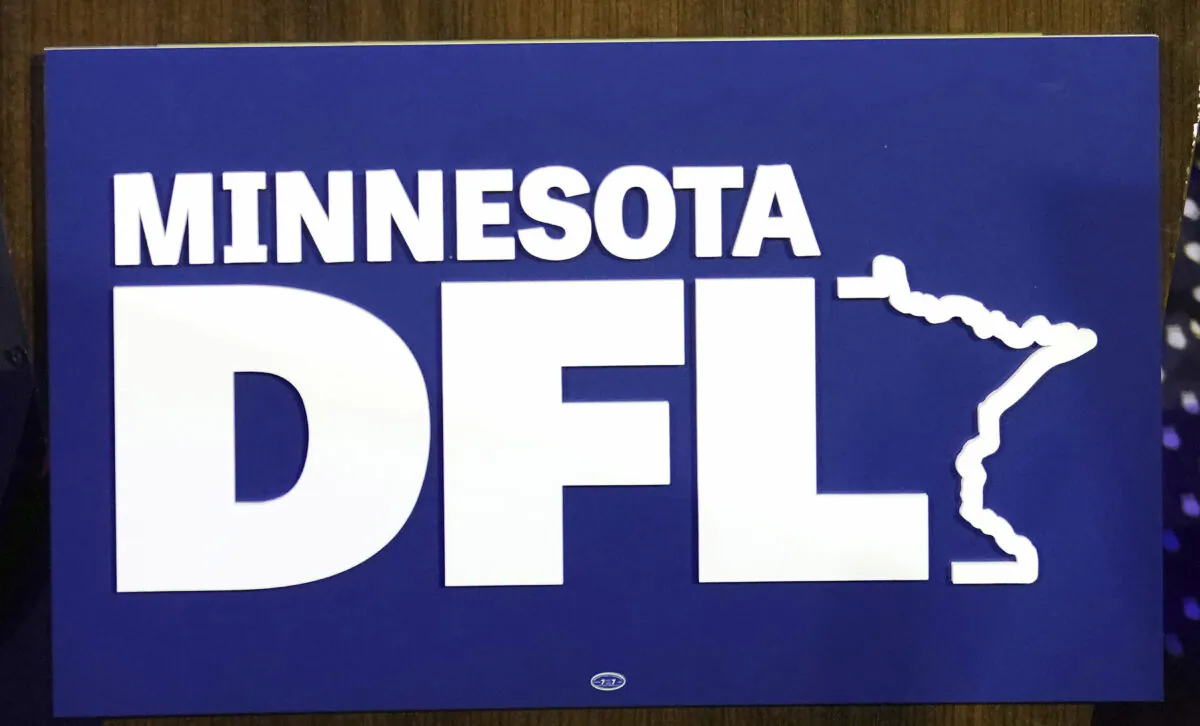 The Minnesota DFL logo appears on a podium at a DFL election-night party, in St. Paul, Minn., on Nov. 8, 2022. (Abbie Parr/AP Photo)