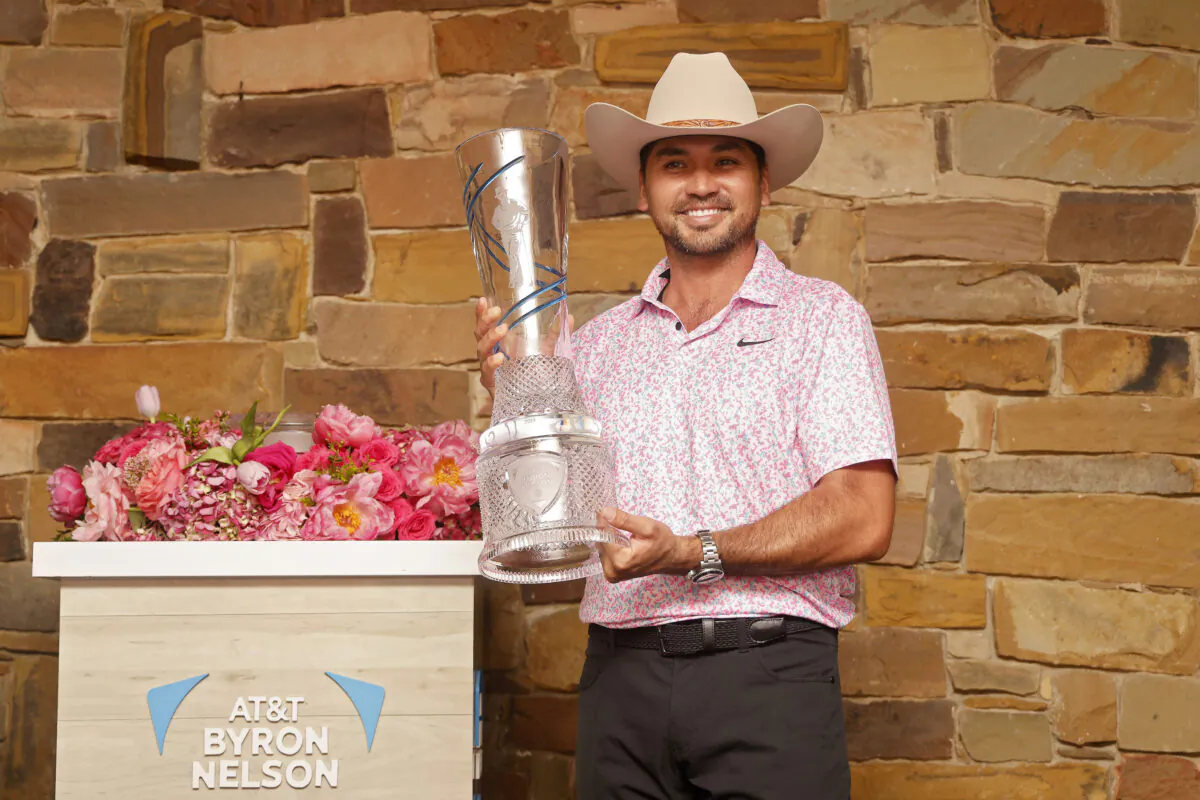 Jason Day of Australia poses for photos with the trophy after winning the AT&T Byron Nelson at TPC Craig Ranch in McKinney, Texas, on May 14, 2023. (Mike Mulholland/Getty Images)