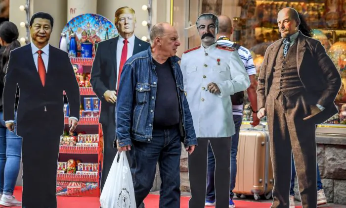 A man walks past cardboard cutouts of Chinese President Xi Jinping, US President Donald Trump, Soviet leaders Joseph Stalin and Vladimir Lenin in downtown Moscow on Aug. 7, 2019. (Yuri Kadobnov/AFP via Getty Images)