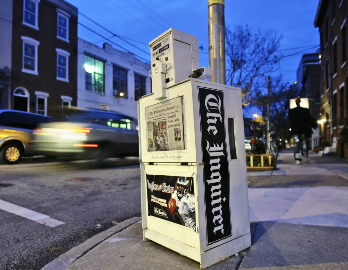 A Philadelphia Inquirer newspaper vending machine stands in Philadelphia on Nov. 30, 2006. (Matt Rourke/AP Photo)