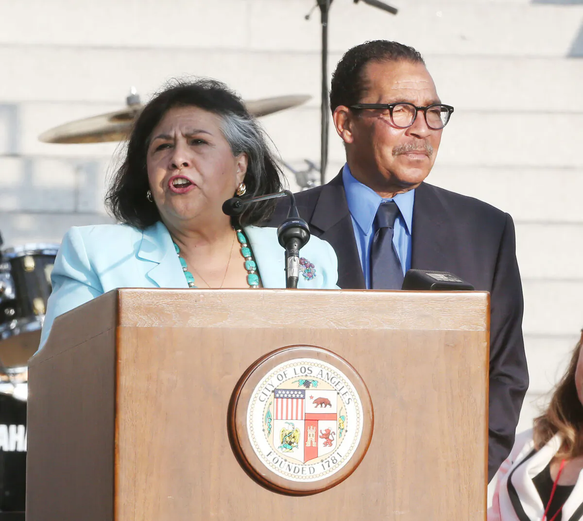 Former supervisor Gloria Molina (L) and former council president Herb Wesson speak during President Bill Clinton Pays Tribute to Mayor Antonio Villaraigosa at Celebrate LA! in Los Angeles, on June 7, 2013. (Frederick M. Brown/Getty Images)