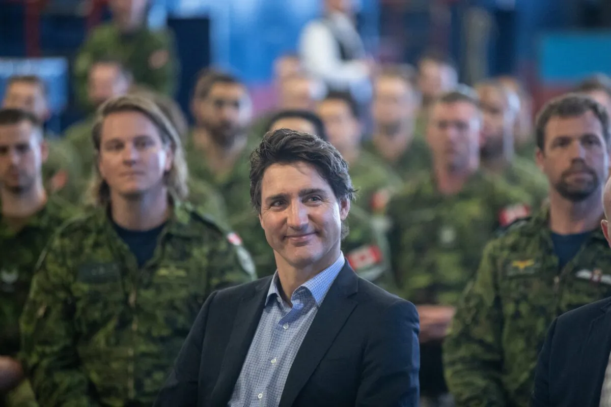 Prime Minister Justin Trudeau meets with members of the Canadian Armed Forces who are assisting in the Alberta wildfires in Edmonton on May 15, 2023. (Jason Franson/The Canadian Press)
