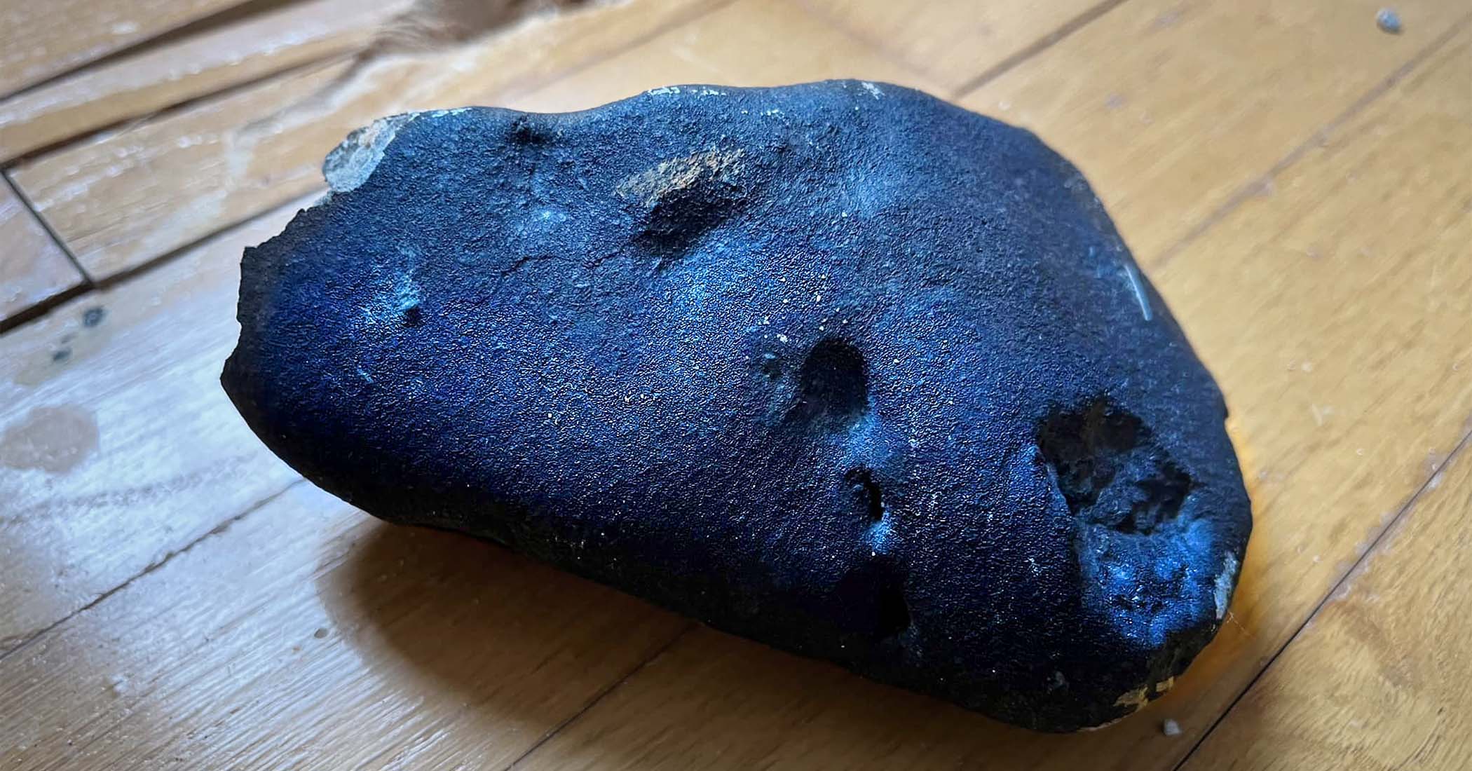 Homeowner finds rock that crashed through roof determined to be meteorite from asteroid belt