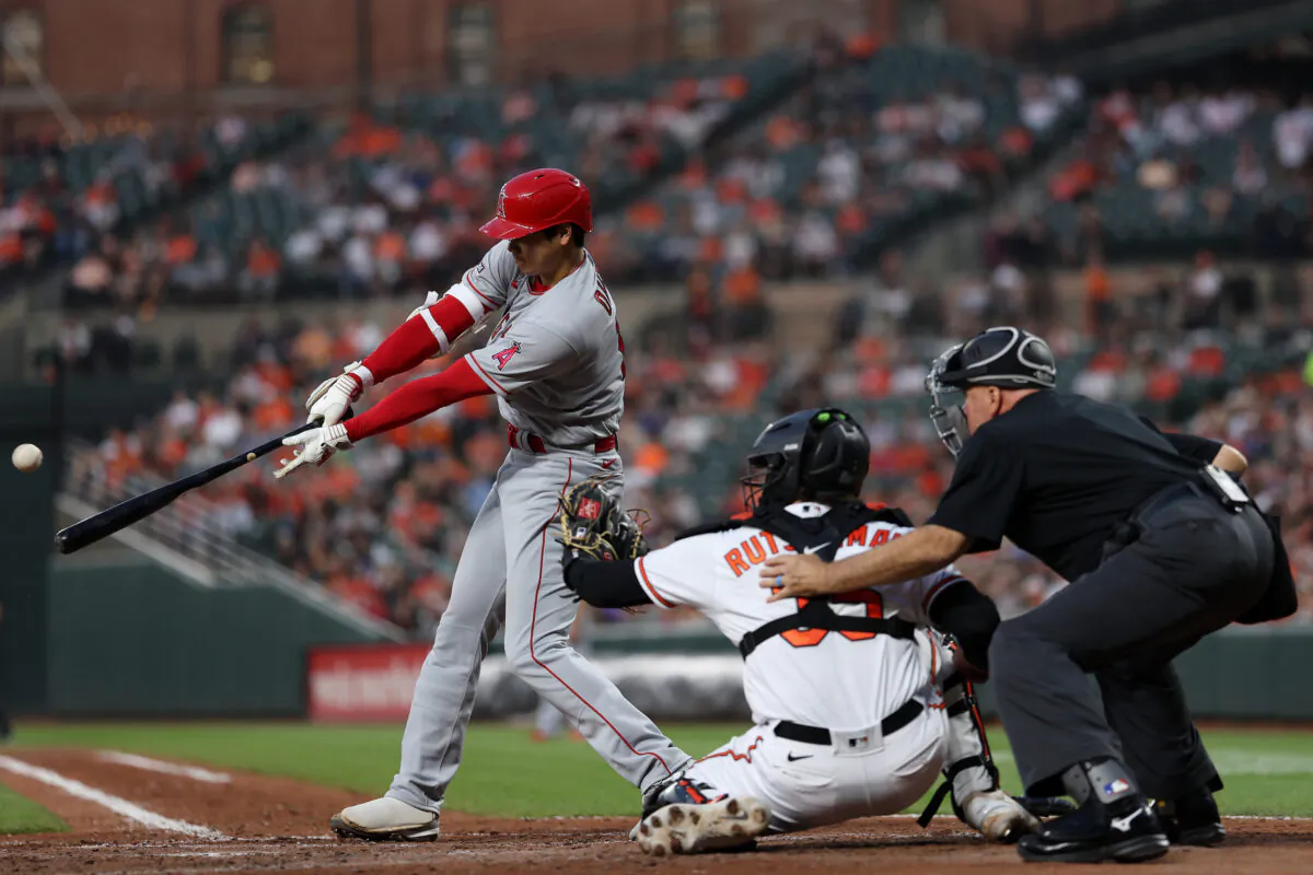 Shohei Ohtani (17) of the Los Angeles Angels hits triple during the fifth inning against the Baltimore Orioles at Oriole Park at Camden Yards in Baltimore on May 15, 2023. (Patrick Smith/Getty Images)