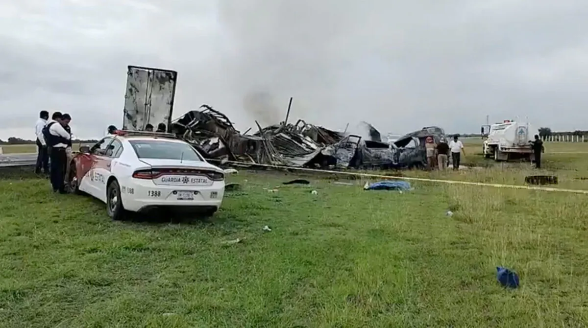 Members of the State Guard gather at the site of a crash, in the Victoria-Zaragoza highway, Tamaulipas, Mexico, on May 14, 2023 in a still from video. (Entorno Informativo Tamaulipas via Reuters)