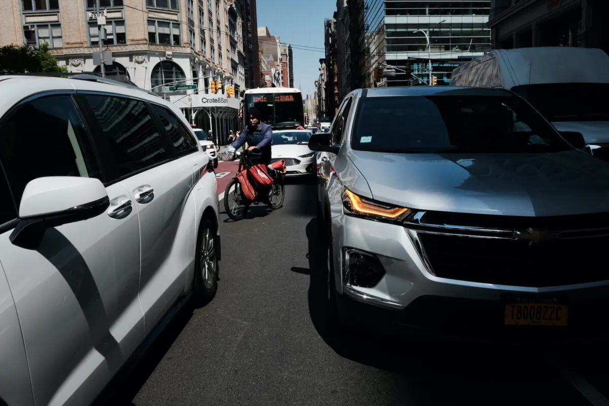 Traffic moves through downtown Manhattan in New York City on April 21, 2023. (Spencer Platt/Getty Images)