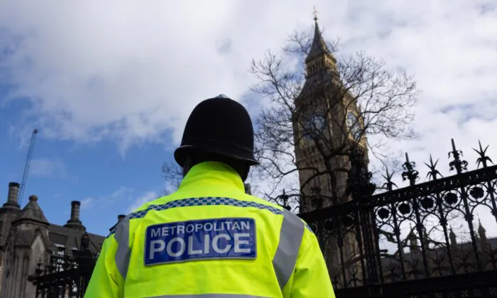 Metropolitan Police officers outside the Houses of Parliament, in London, on March 21, 2023. (Dan Kitwood/Getty Images)